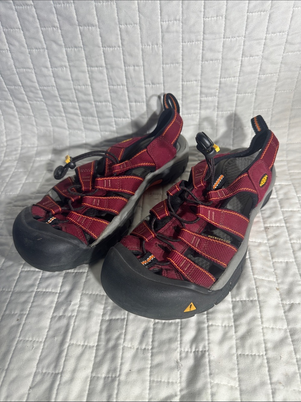Keen Newport H2 sandals in a burgundy or red colorway